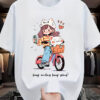 “Keep Smiling Keep Going” Cute Girl & Cat Bicycle Graphic T-Shirt – White Cotton Tee